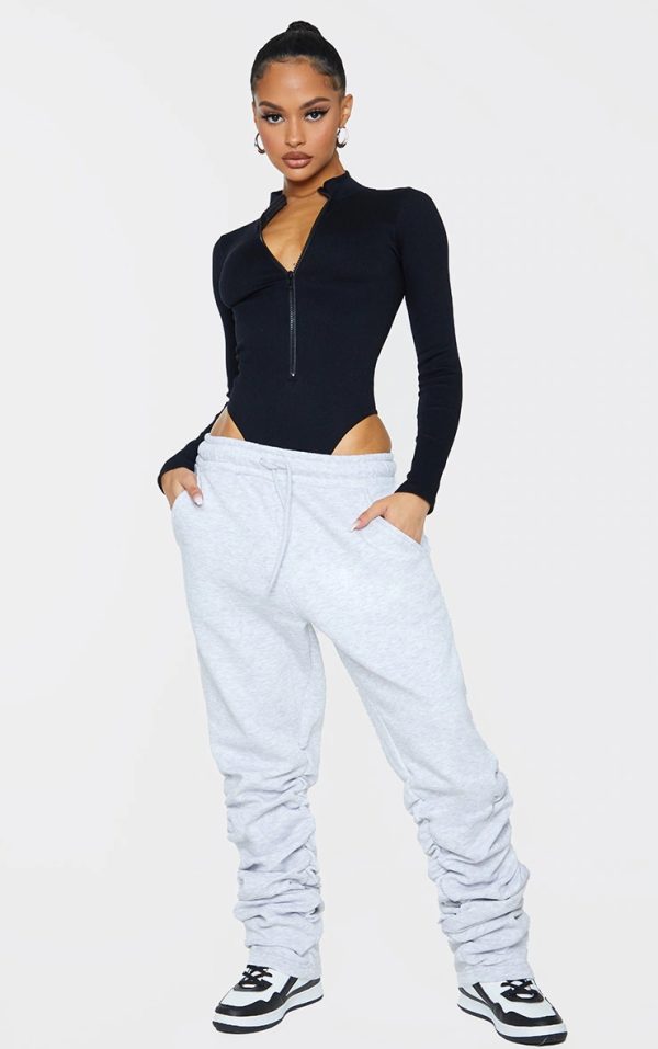 6c6b3e31e15400191ff0f3df657f6c7a5875a5e1_CMT6658_3_black_contour_rib_zip_up_long_sleeve_bodysuit