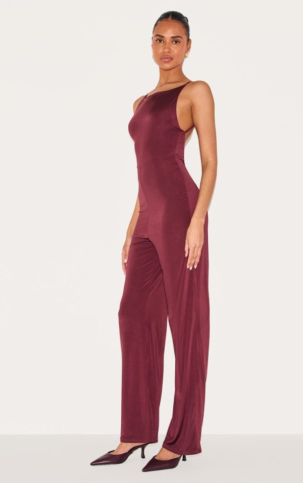 6d33bc6e81a401ec463da0c5a069ede4d4702e3b_CNM3114_3_wine_double_layer_slinky_low_back_strappy_wide_leg_jumpsuit