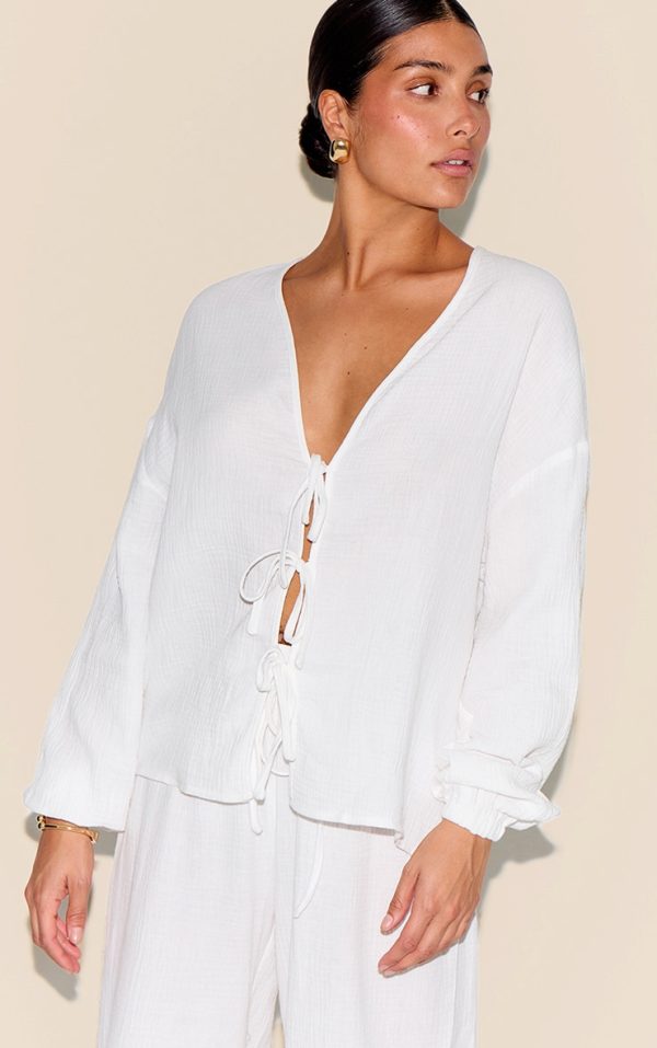 6d78c817dd5c72a23019b02d9d1407fad09125b5_CNM3962_1_petite_white_cheesecloth_textured_tie_front_shirt