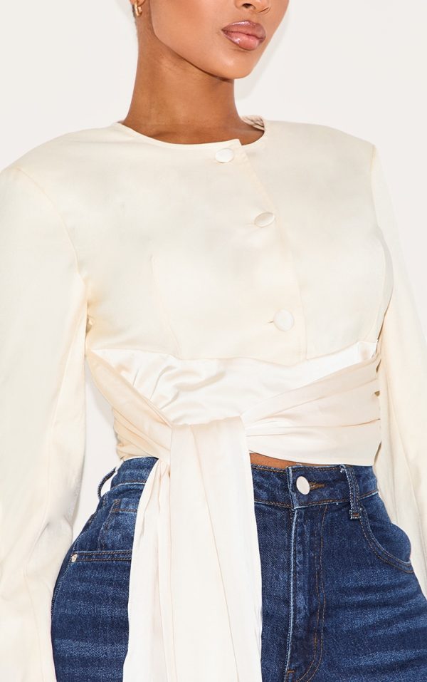 6d850ba2cb069f06311cdf6aeb7946da716d5880_CNM1014_4_shape_cream_tailored_wrap_wasit_long_sleeve_top