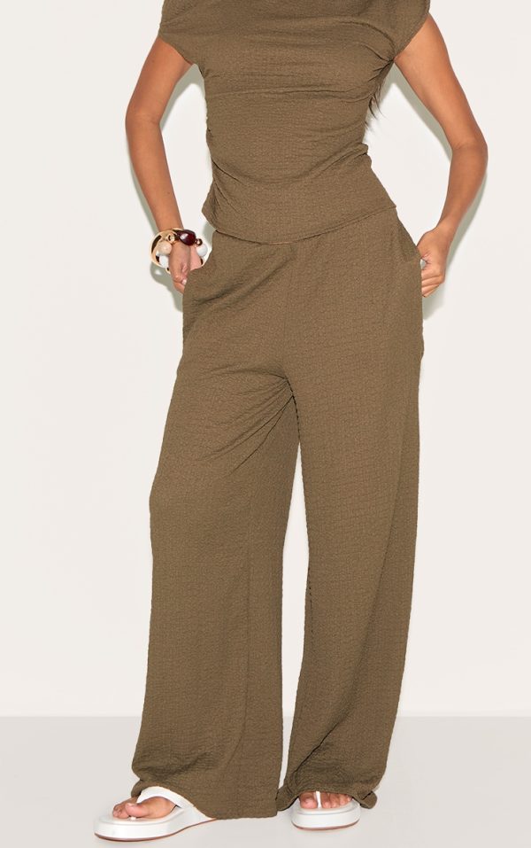 6e01c26611fcbefe56adc7b3748c2ec285bba7af_CNM8869_2_dark_green_textured_mid_rise_wide_leg_trousers