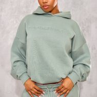 6f70f6850b8452745bf798442513974c975d01d3_CNK1766_1_prettylittlething_sage_athletics_club_embossed_graphic_oversized_hoodie