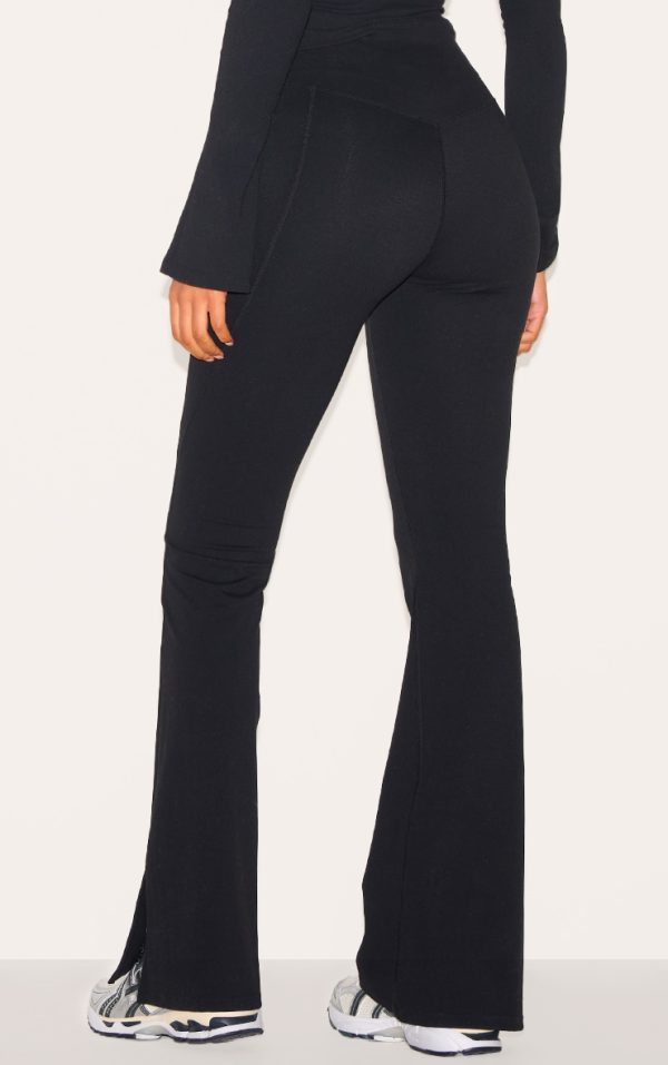 6fa39dd3d1643d59ed19596473f4ff6d3145e2da_CNM1160_3_tall_black_contour_sculpt_seam_detail_flare_leggings