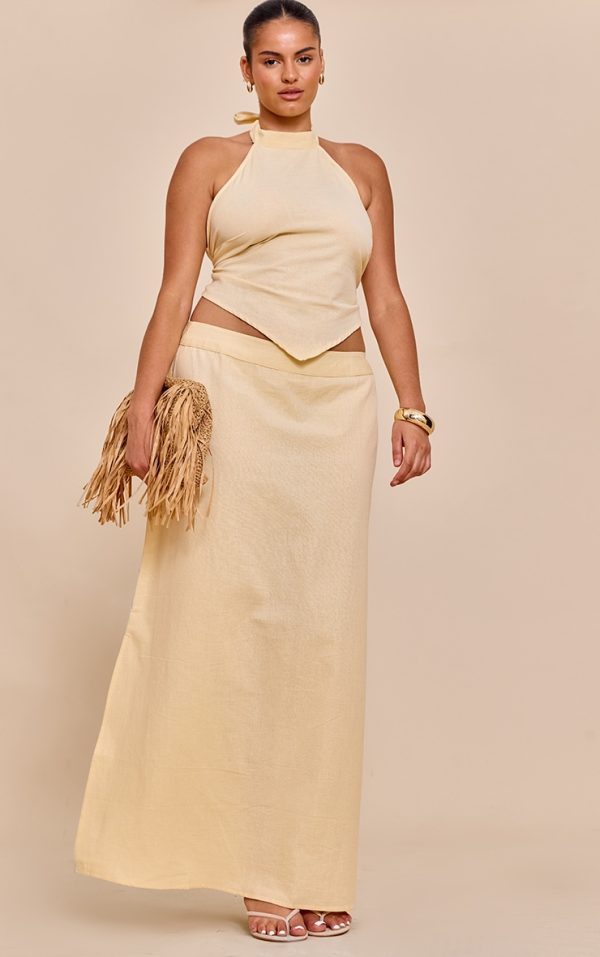 7053eb8e41e4c230184020de34431ed432b81bd9_CNM5104_3_plus_butter_cream_embroidered_halterneck_top