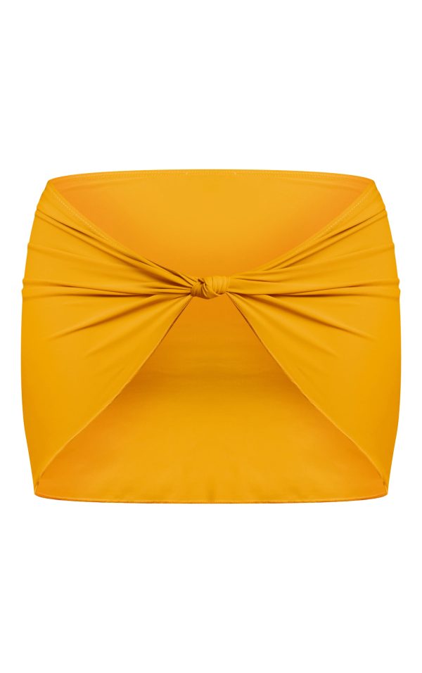 709da5583fec65b26b6e847f6d7e880d92bfc3a1_CNM9326_6_mustard_knot_detail_mini_beach_skirt