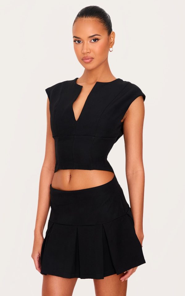 715216825d3c57926edf590a830dc322aa2db106_CNL3207_4_black_tailored_woven_low_rise_pleated_micro_mini_skirt