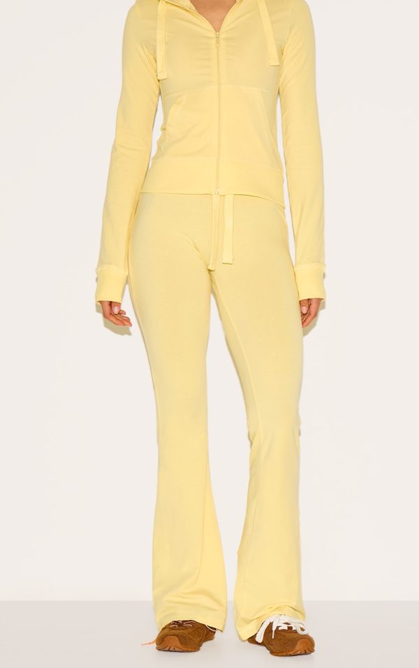 719823786edcf82bab244cd4bacc4a9b369b1963_CNN0622_2_butter_yellow_low_rise_skinny_flare_trousers