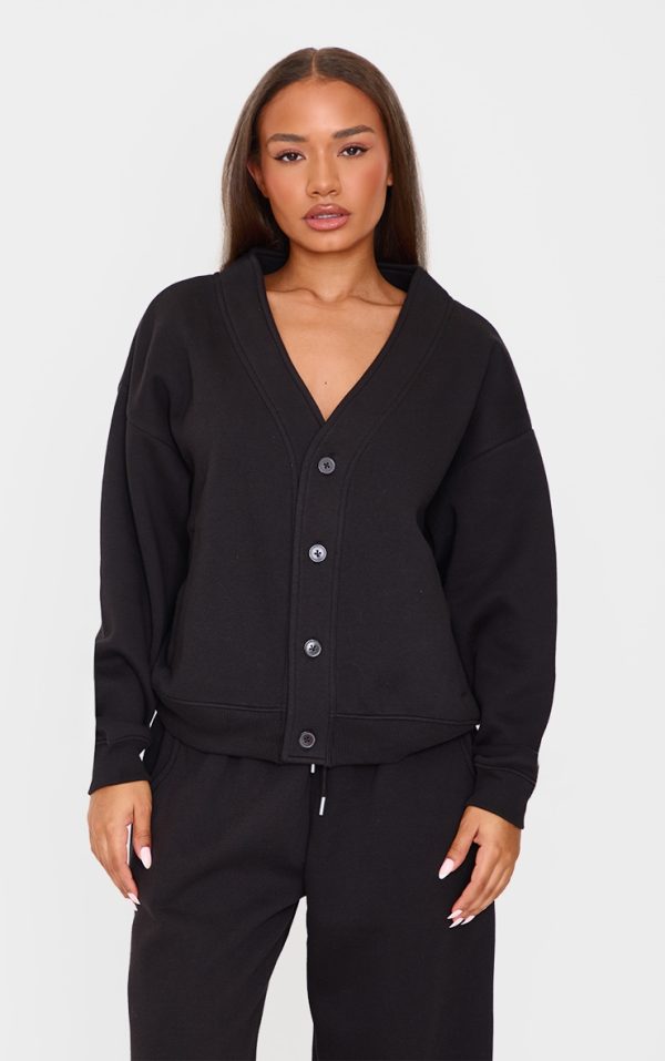 719d72084b458c76d6494aa0ef50e97587689460_CNL1404_1_petite_black_button_up_side_pocket_sweatshirt