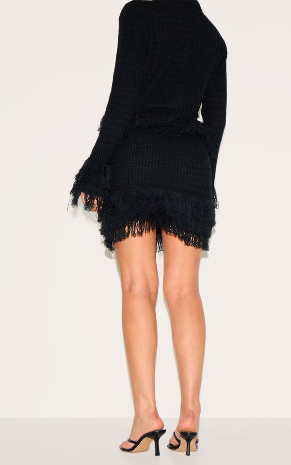 72580804f1cb48d338ad0a51eae9e06170e54f82_CNN2571_3_petite_black_rib_fringe_hem_knit_skirt