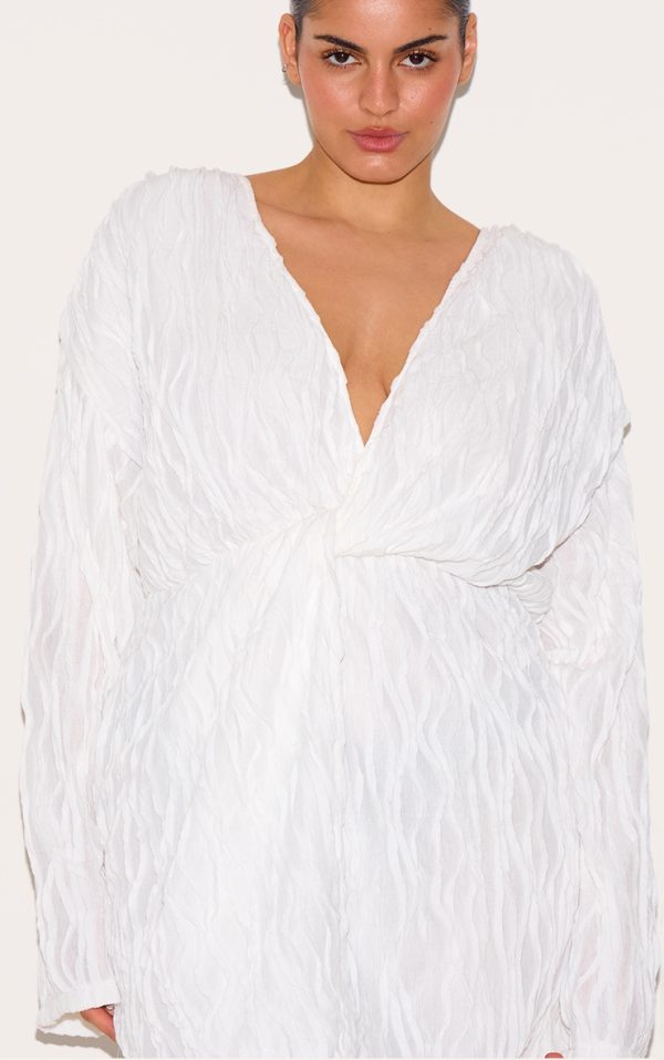 728bf1ada189efec2bbf8dc7ea6c5be814d5d289_CMR0790_4_plus_white_textured_wrap_front_dress