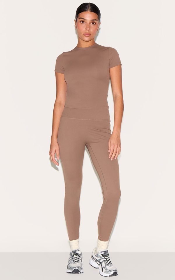 74305f3c0493b5a733eb090ff2c742e6279dd2db_CNM4972_3_petite_mushroom_sculpt_longline_gym_top_short_sleeve