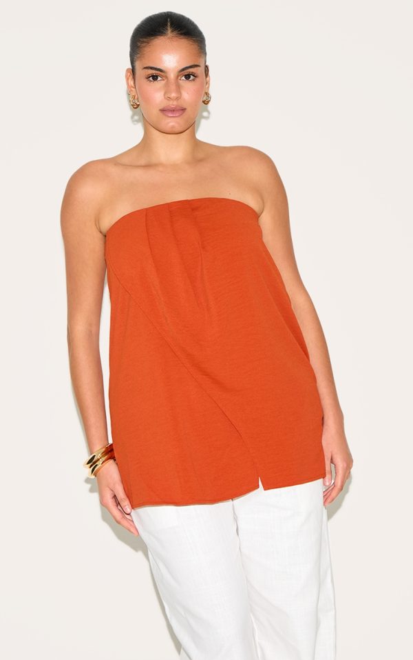 74f7272e6a78d797180b8701e9572e291320180e_CNM7811_1_plus_rust_floaty_woven_split_hem_bandeau_long_top