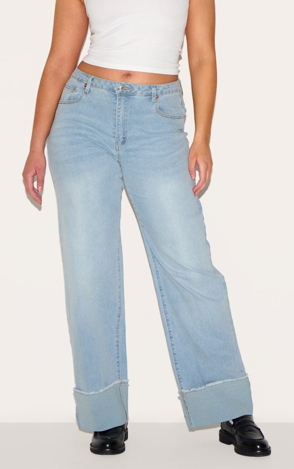 7523b9bac1e5fadb79237f30cb36b149cba14507_CNM1003_2_shape_light_blue_stretch_denim_highwaisted_distressed_turn_up_hem_jeans