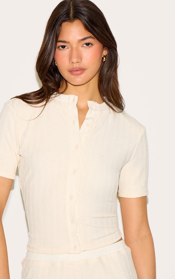 75866d9095214b718b1c1c64aa2f1f25b102588c_CNM6176_4_butter_yellow_textured_button_up_longline_top