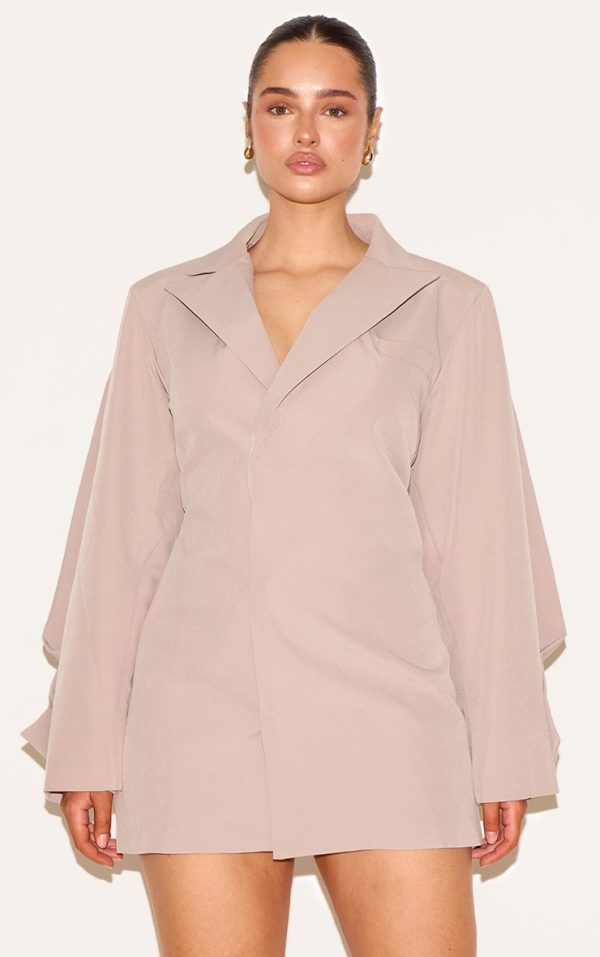 75a1efc8754d512d3611fa1d2173a747cda704cb_CNM1378_1_shape_beige_woven_cinched_adjustable_waist_blazer