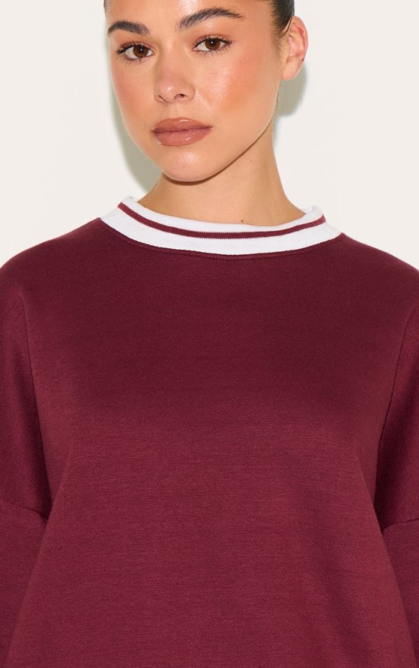 76f6d7bc912a7db709ed5a06ef8083688eaec739_CNL4111_4_burgundy_striped_ribbed_hem_oversized_sweatshirt-1