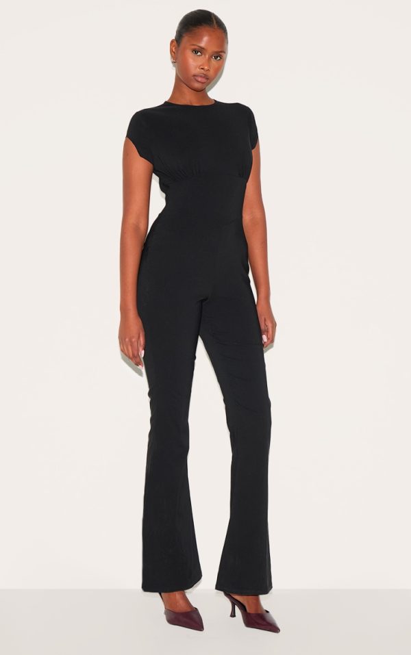 77139050bd0ba4487ec0ee0093e43033e9c0bc11_CNM3120_3_black_stretch_woven_corset_detail_cap_sleeve_flared_jumpsuit