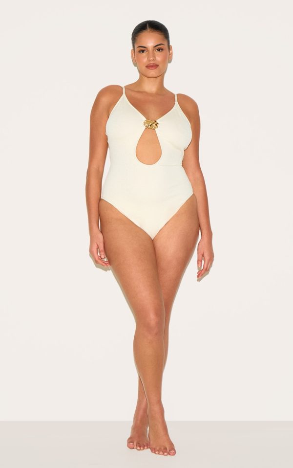 777a5add417f143c8c3377af53c4690036fbf0ba_CNM4875_3_plus_cream_textured_flower_trim_plunge_swimsuit