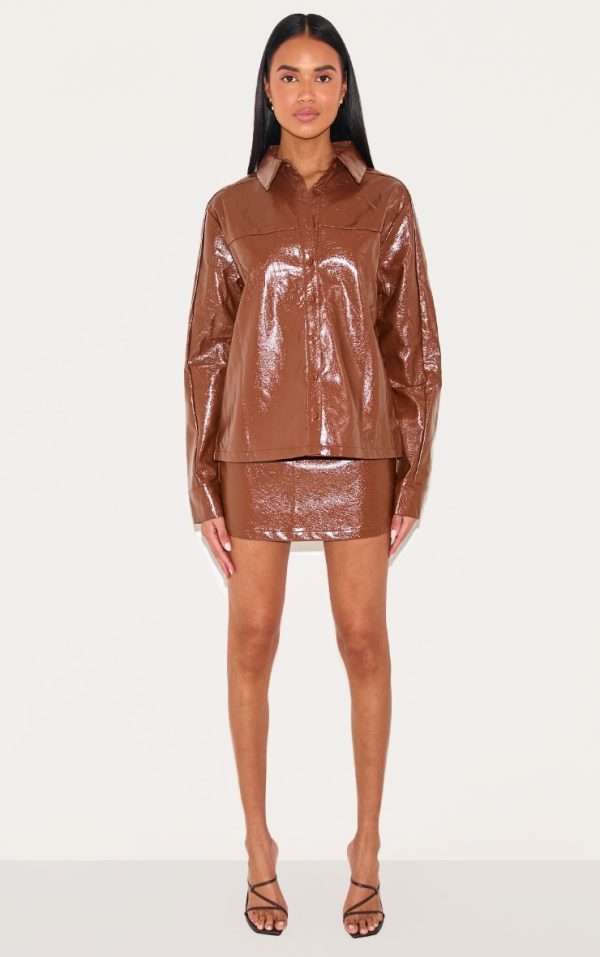 77ced9beb8cd5c0dbd3c279d0d42771c43e3dfd2_CNL6586_1_chocolate_faux_leather_mini_skirt