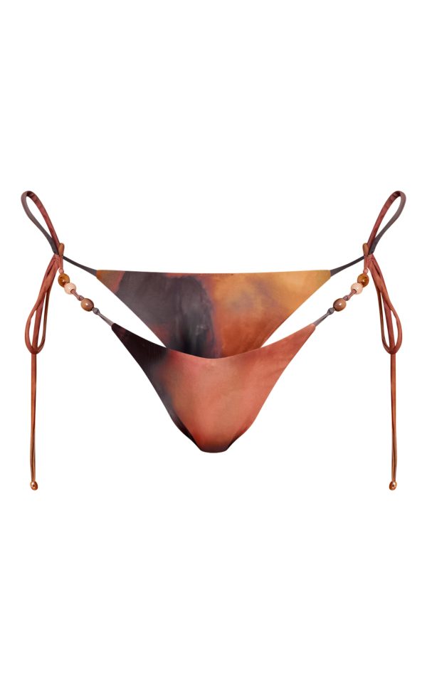 7837496afec4ed40a766425f61c2e13b016e23d3_CNM8314_5_multi_blurred_print_bead_trim_tie_side_bikini_bottoms