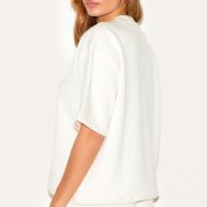784cf43aecf4629a9fde59dabd4a885bf4f57e0e_CNI1468_2_prettylittlething_cream_badge_detail_oversized_short_sleeve_sweatshirt