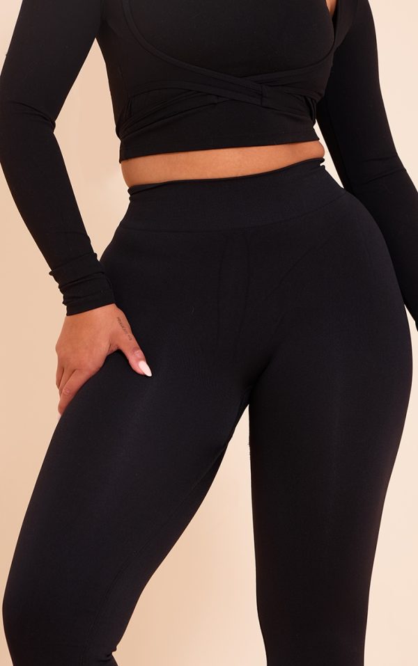 7905ef979f0b97cebc9d7001d9da05ebc4aee093_CNM8517_4_shape_black_seamless_active_high_waisted_ruched_bum_flares