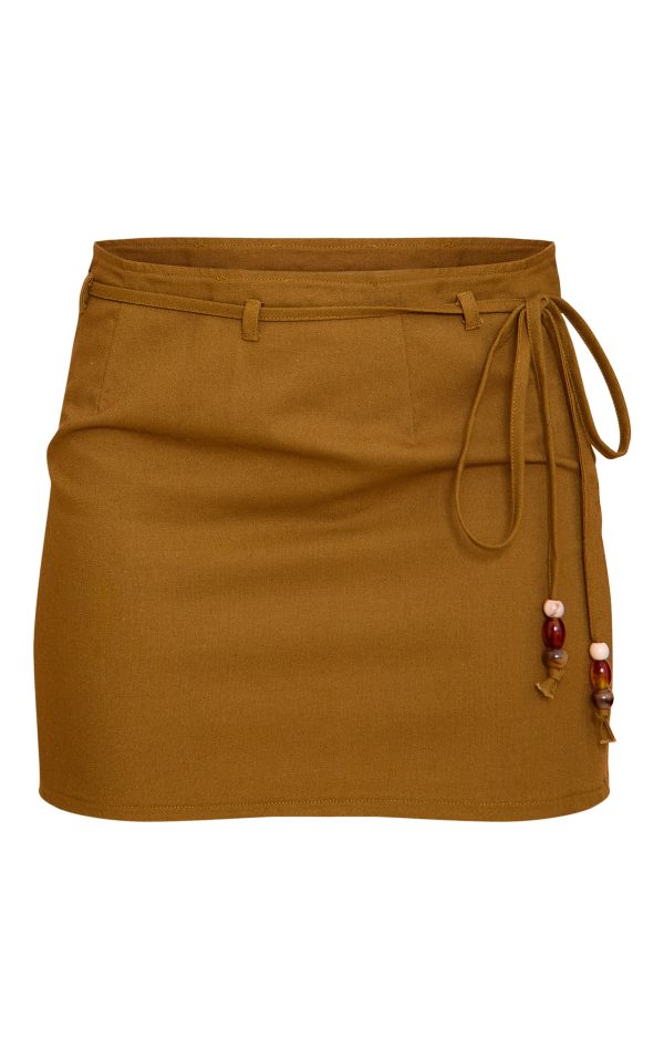 791984b16bae3e0bd4d177edbe6b3786d6bb8da6_CNM6136_6_olive_trim_detail_asymmetric_mini_skirt