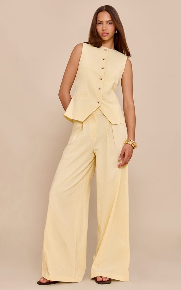 799a87714e3f9018e0acda8e2c3f20f3c4e2e22e_CNM9848_1_butter_yellow_wide_leg_pleated_trousers