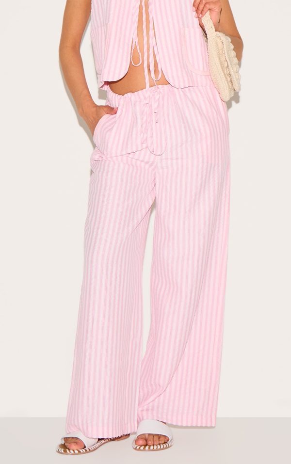 79a9d514f247cd4c69120c83327d411eb8576d80_CNM9052_2_petite_pink_striped_woven_wide_leg_trousers