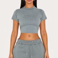 79b203404e4fc736e5d9d75ae02427f940a21c81_CNK0427_1_petite_teal_plt_embossed_cropped_baby_tee