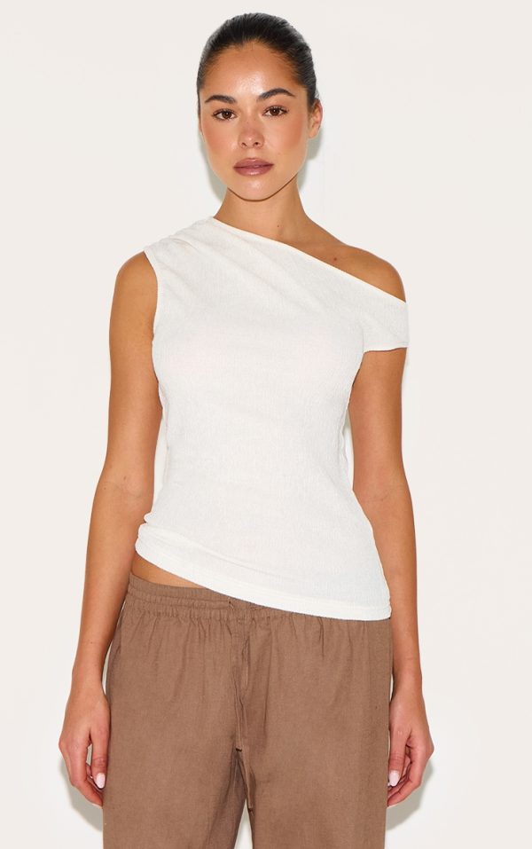 79b4af4337919638db81848c982cc4d88178b217_CNM8067_1_cream_textured_asymmetric_neckline_long_top