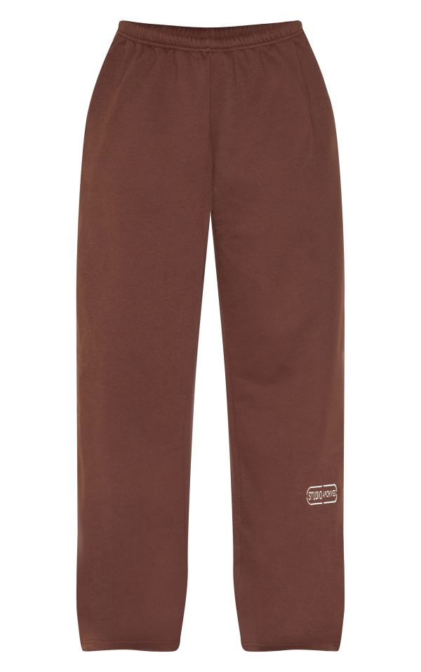79fa66cde8a365867e542d32312361dece81bc2b_CNM4805_5_chocolate_studio_archives_embroidered_thin_waistband_drop_crotch_joggers