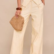 7a2c21a06f92f493847a9111fc2518f53f820316_CNM6318_2_almond_textured_pleat_mid_rise_wide_leg_trousers