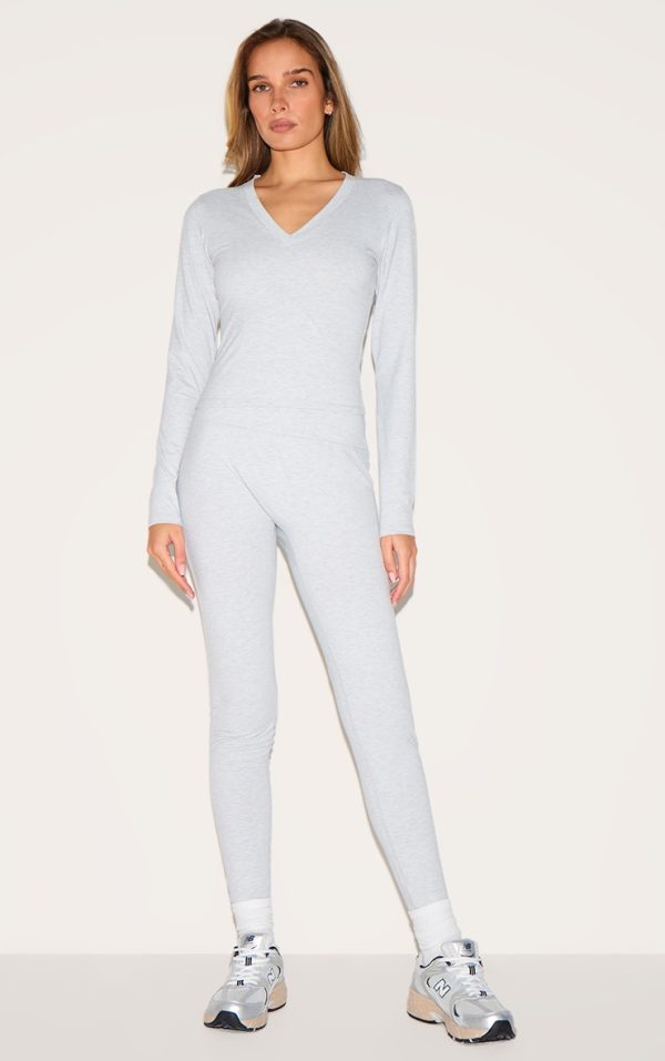 7a41307070b5570c4c2fd9911e2372e718cc5612_CNL1762_3_ash_grey_sculpt_v_neck_long_sleeve_longline_top
