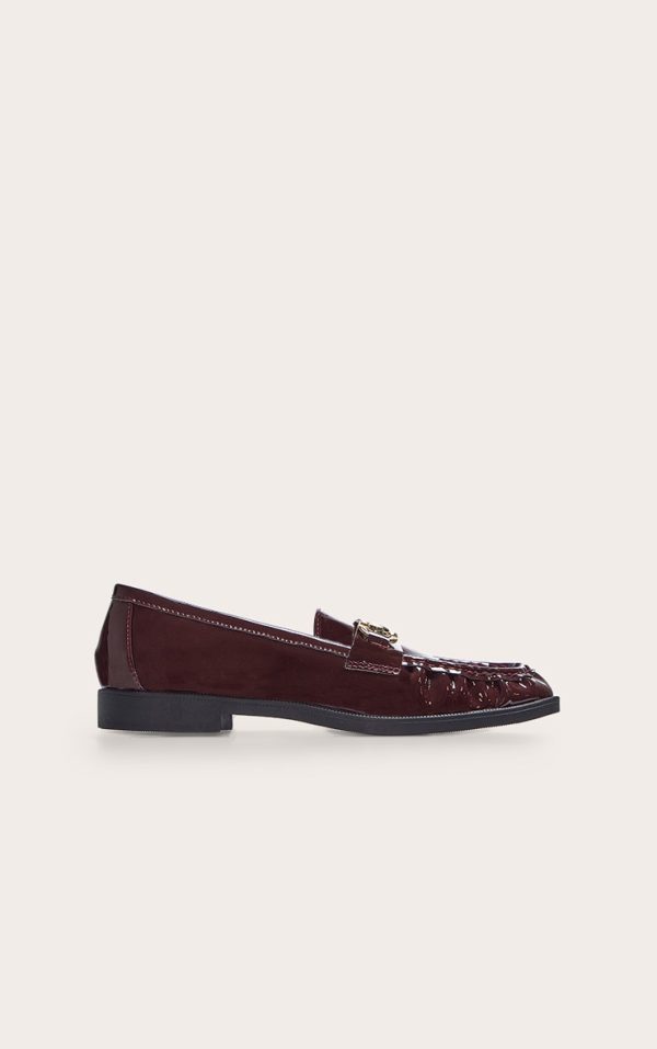 7aa6291248c592044c88642c619607243468264b_CNN2127_1_burgundy_patent_loafer_with_gold_buckle_detail