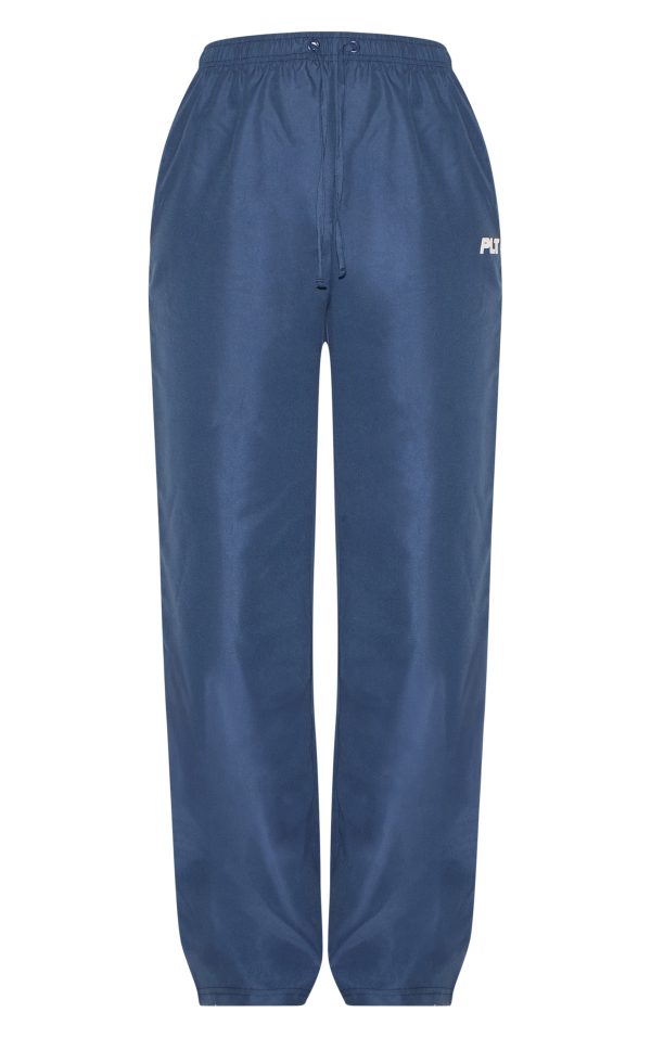7b2e1d4de69053e0411f296e76eb751cefcfe8b6_CNL8298_5_prettylittlething_tall_navy_shell_drawstring_wide_leg_trousers