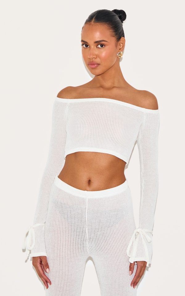 7b329b9a4693499eee093ad90de696d3d1aeb7bf_CNK4892_1_cream_sheer_soft_rib_bardot_long_sleeve_crop_top
