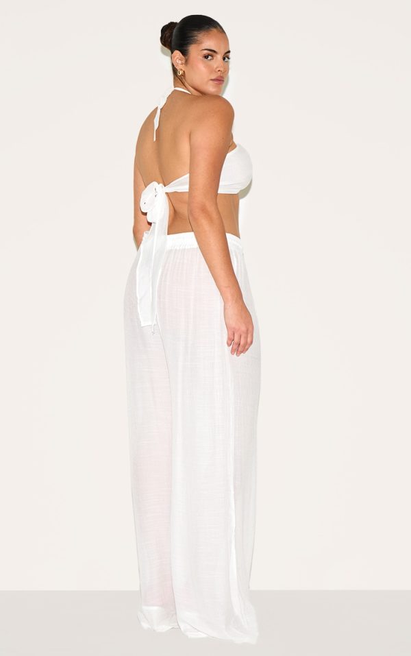7c1ccea431c344ab3e56b49e0ed8e2fbeb352eb5_CNM3059_2_plus_white_trousers_and_top_set