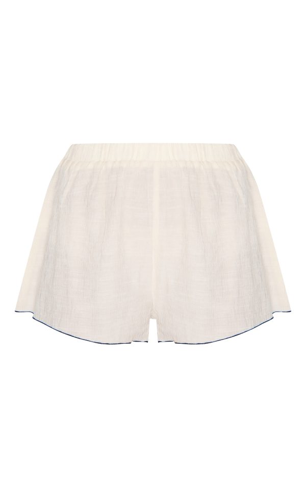 7c443898004954443340f4f03c844580789495b2_CNM5357_6_sand_textured_contrast_trim_floaty_shorts
