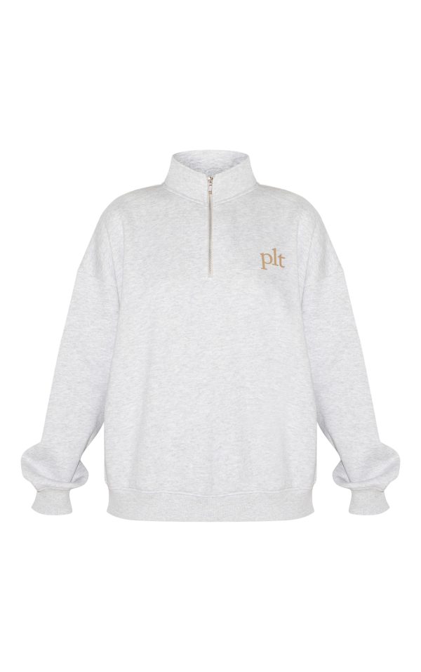 7c8c6deec394b9cbfc429f3c7437a27cd30383c9_CNM3807_5_prettylittlething_ash_grey_printed_quarter_zip_sweatshirt