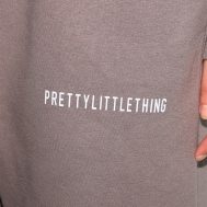 7c99bdc9e6559af4ab48b9d3dd623ccf262eee52_CNE5752_4_prettylittlething_plus_charcoal_grey_oversized_slogan_joggers