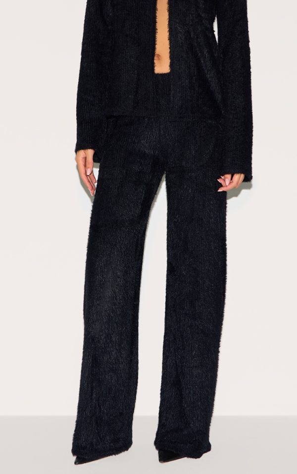 7cf4ef555519a08ae53e78c4e9c382b4e2455019_CNM2120_2_black_textured_wide_leg_low_rise_trousers-1