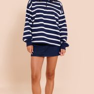 7d093f64796bab7e33fe4842263a0e96b5f30d68_CNM4729_2_indigo_button_up_denim_mini_skirt