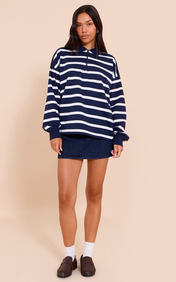 7d093f64796bab7e33fe4842263a0e96b5f30d68_CNM4729_2_indigo_button_up_denim_mini_skirt