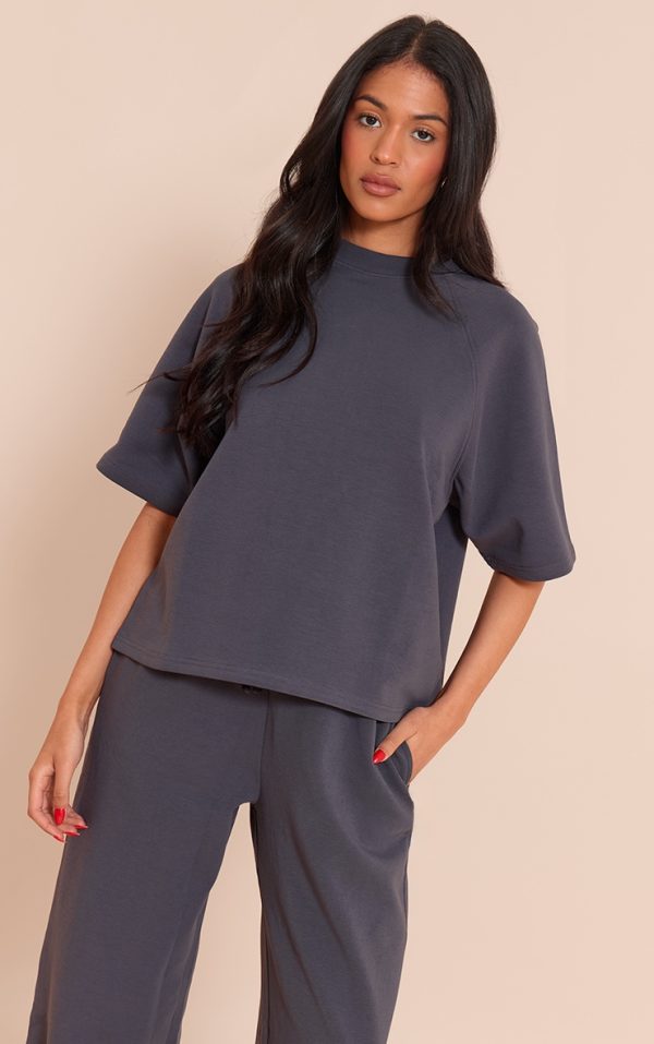 7d9f69e653a9d7a95d7bbe3c4c1d38c258a5cad2_CNM9876_1_tall_navy_interlock_cropped_boxy_sweatshirt
