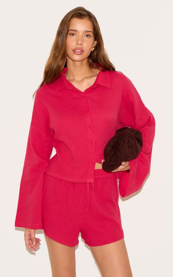7e1c48d59f66241a22d4e9c3e49f417aff63c1f9_CNM7096_1_tomato_red_oversized_button_up_shirt