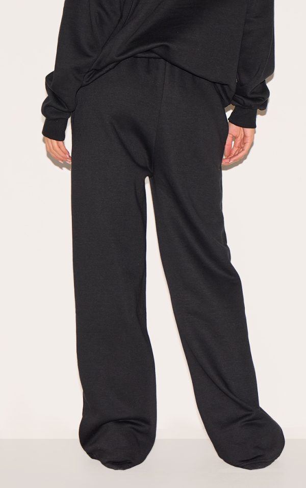 7e3d74a638266dac4b14f1fc0e4a25c244628e2d_CNL9650_3_black_wide_leg_new_york_printed_joggers