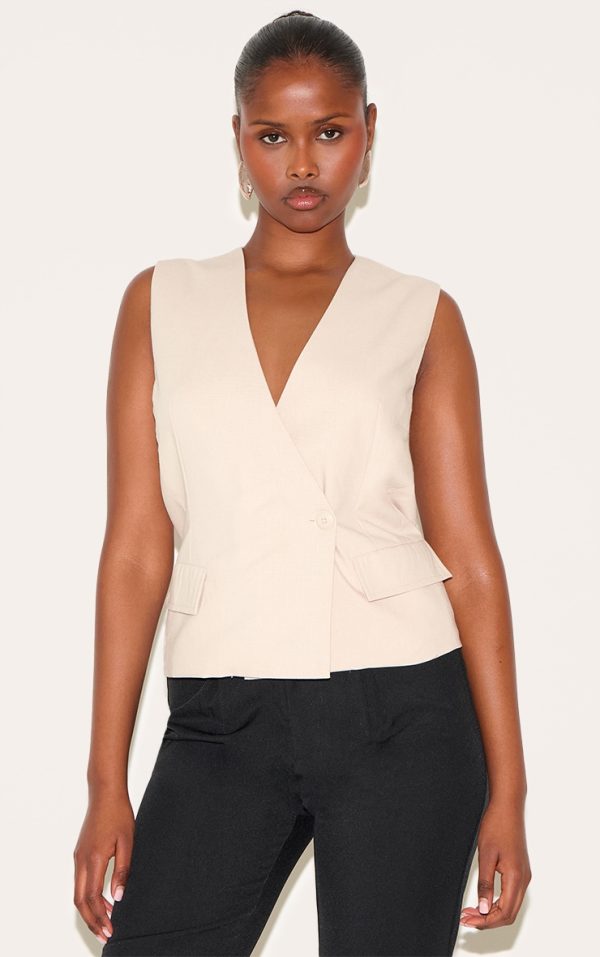 7e7136a5e0c4fdd72a725bc4e4a882a0d6bc94af_CNL9819_1_sand_boxy_asymmetric_waistcoat