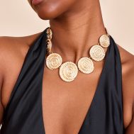7e8de2616639c66126eef59d0e262d77acd43bd6_CNN3734_1_gold_hammered_swirl_detail_chunky_necklace