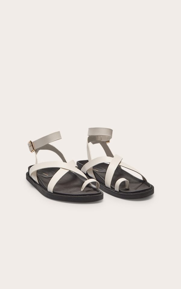 7f3c04402d20636bd8ea0bb4bed04101704bc638_CNL6799_2_cream_pu_round_toe_gold_toe_loop_strappy_footbed_sandals